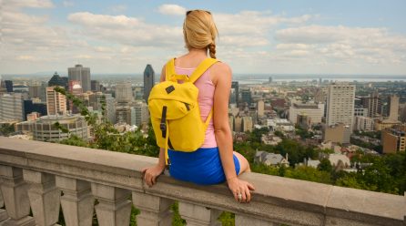 Blonde,Woman,Looking,At,Montreal,Downtown,Skyline,Cityscape.,Canada.